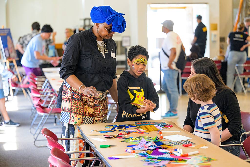 Kids and adults doing art s and crafts