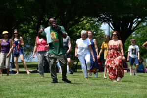 People dancing outside at Juneteenth celebration