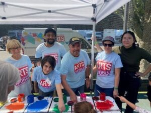 artsmobile workers with kids
